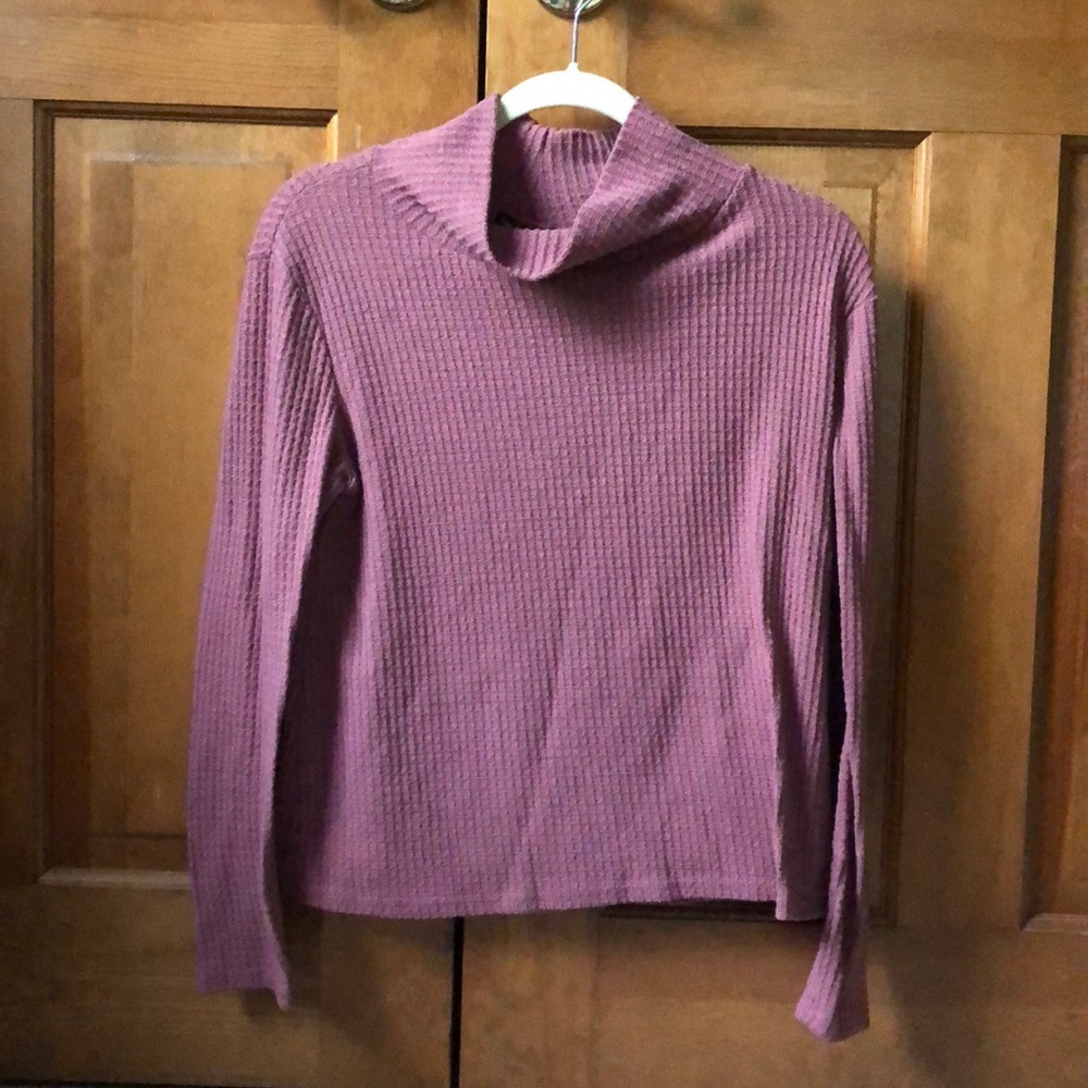 Dusty pink turtle neck.